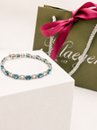 Pulsera Rivière en Oro Blanco con Esmeraldas y Brillantes