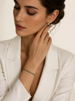 Pulsera Rivière de Esmeraldas en Oro