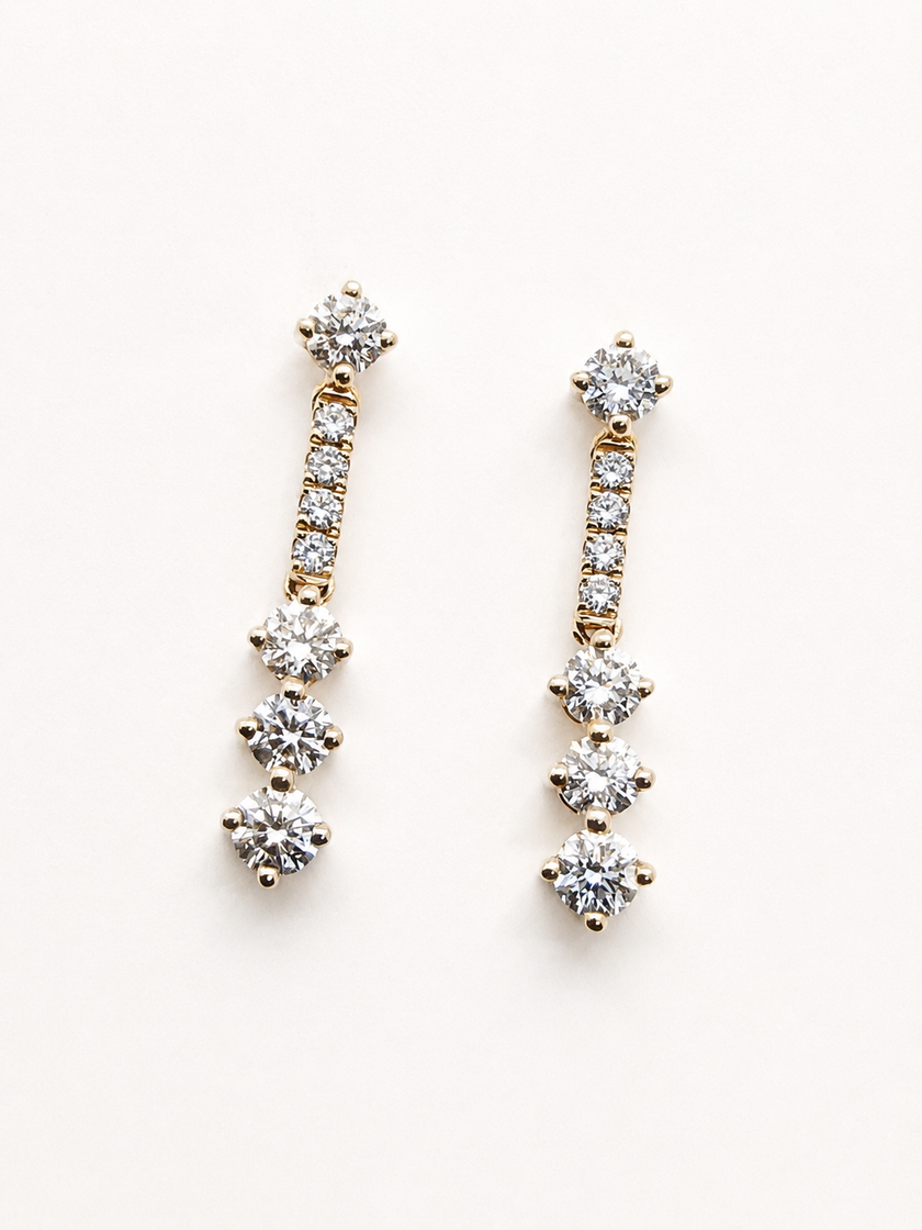 Aretes Colgantes de Diamantes en Oro Amarillo