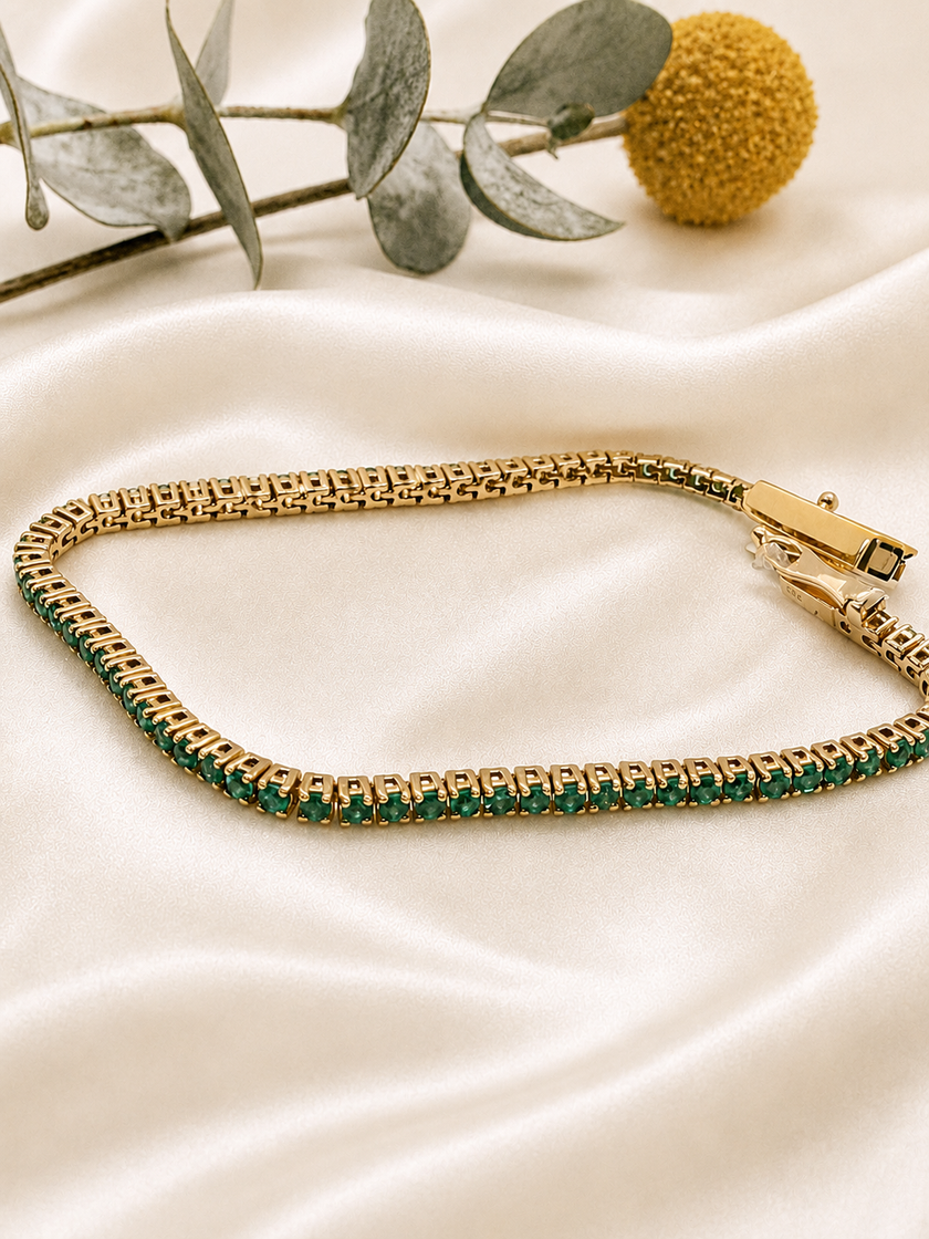 Pulsera Rivière de Esmeraldas en Oro